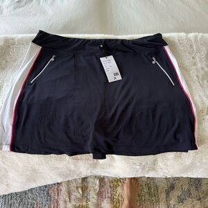Cute black and white golf or pickleball skort (skirt with shorts underneath)